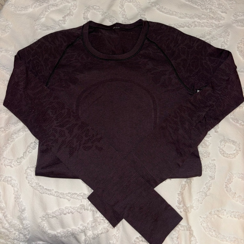Dark purple swiftly tech